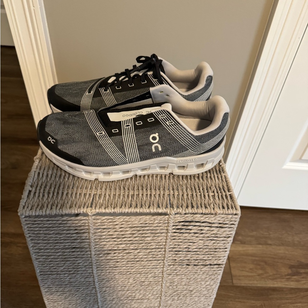On Running Black and White Sneakers